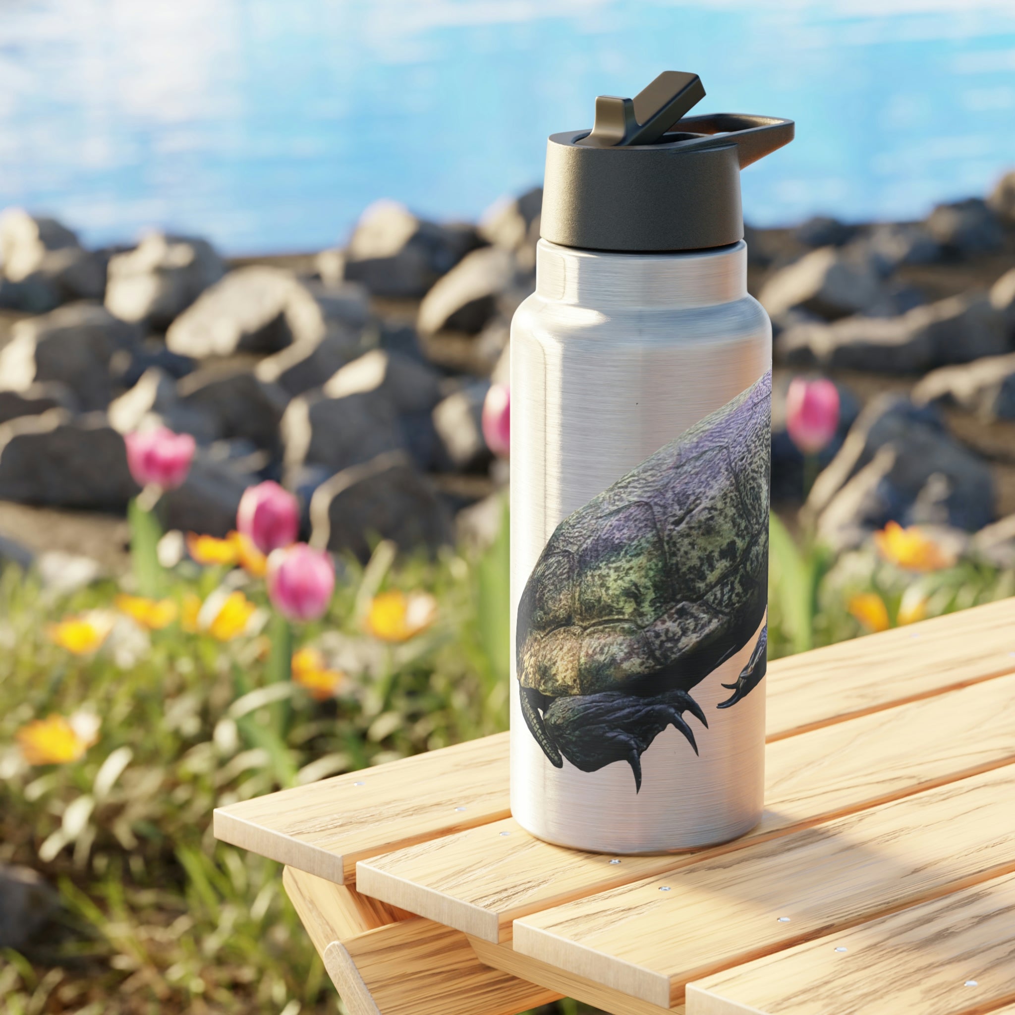 Turtle Gator Tumbler in stainless steel with a black cap and plastic straw, showcasing a customizable design.