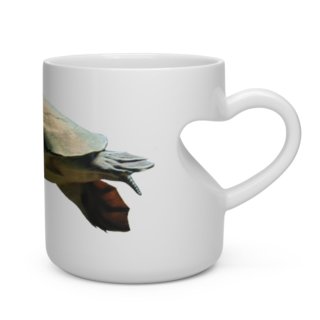 A white ceramic mug shaped like a heart with a heart-shaped handle, perfect for hot beverages.