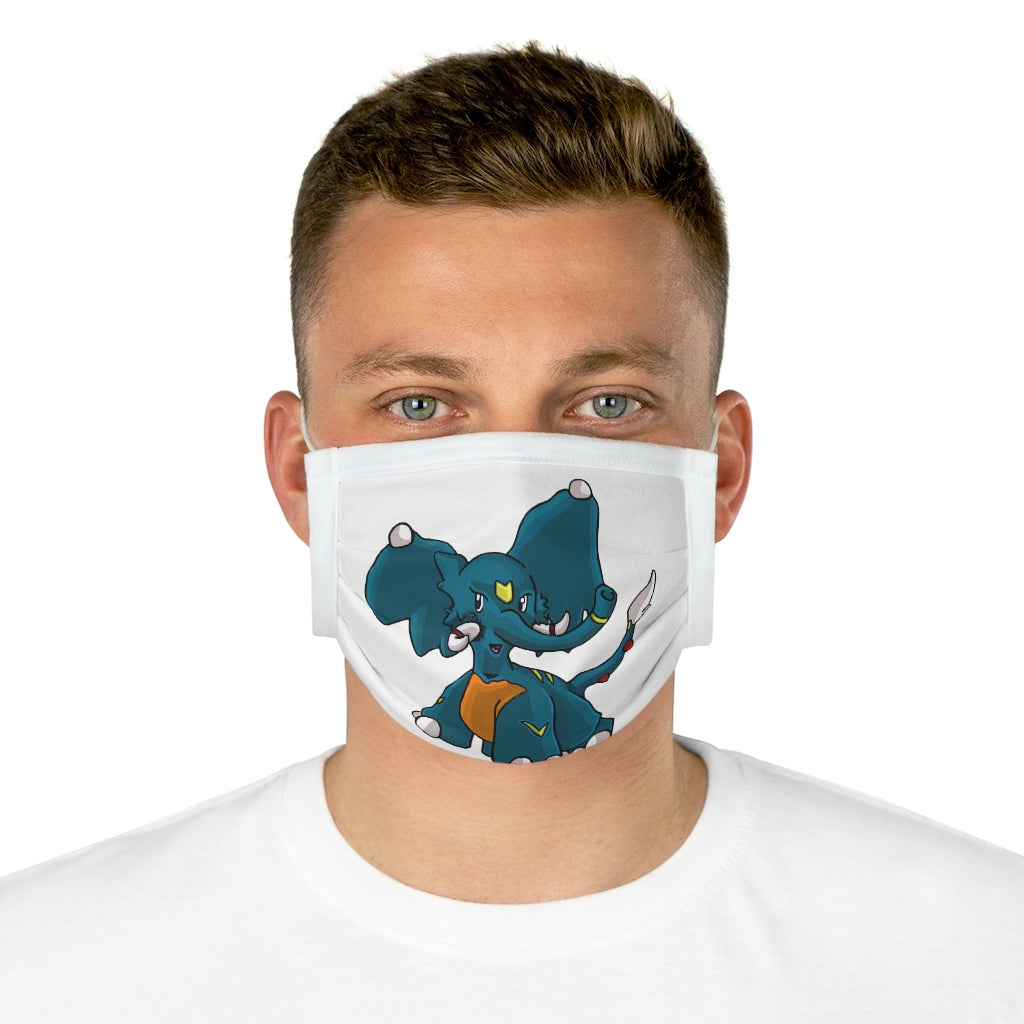 Tuskhann Cotton Face Mask featuring vibrant motifs and adjustable earloops, made from 100% cotton for comfort and style.