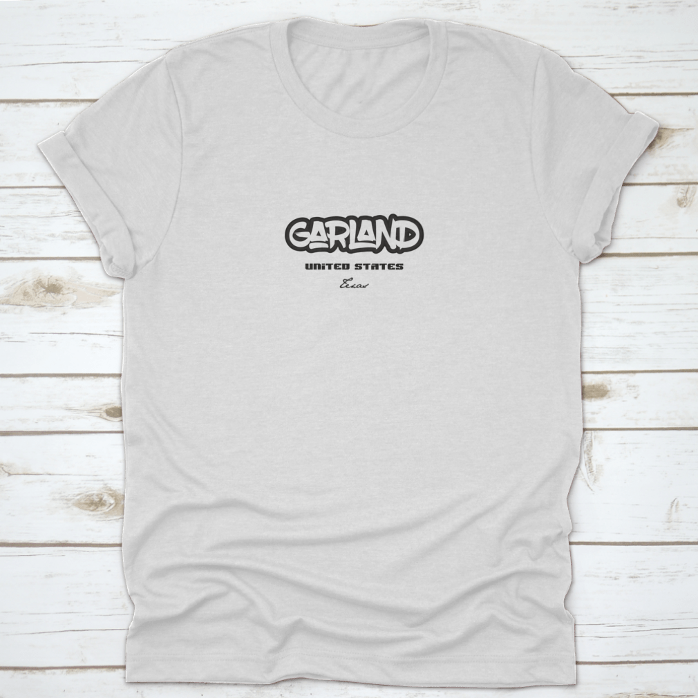 Typography design showcasing Garland, Texas, on a stylish cotton apparel piece, featuring a classic fit and midweight fabric.