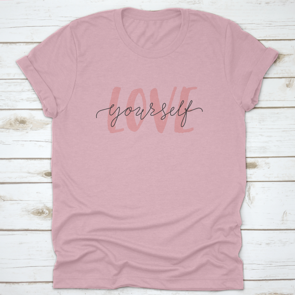 Vector illustration of a T-shirt featuring the 'Love Yourself' lettering quote, promoting self-care and positivity.