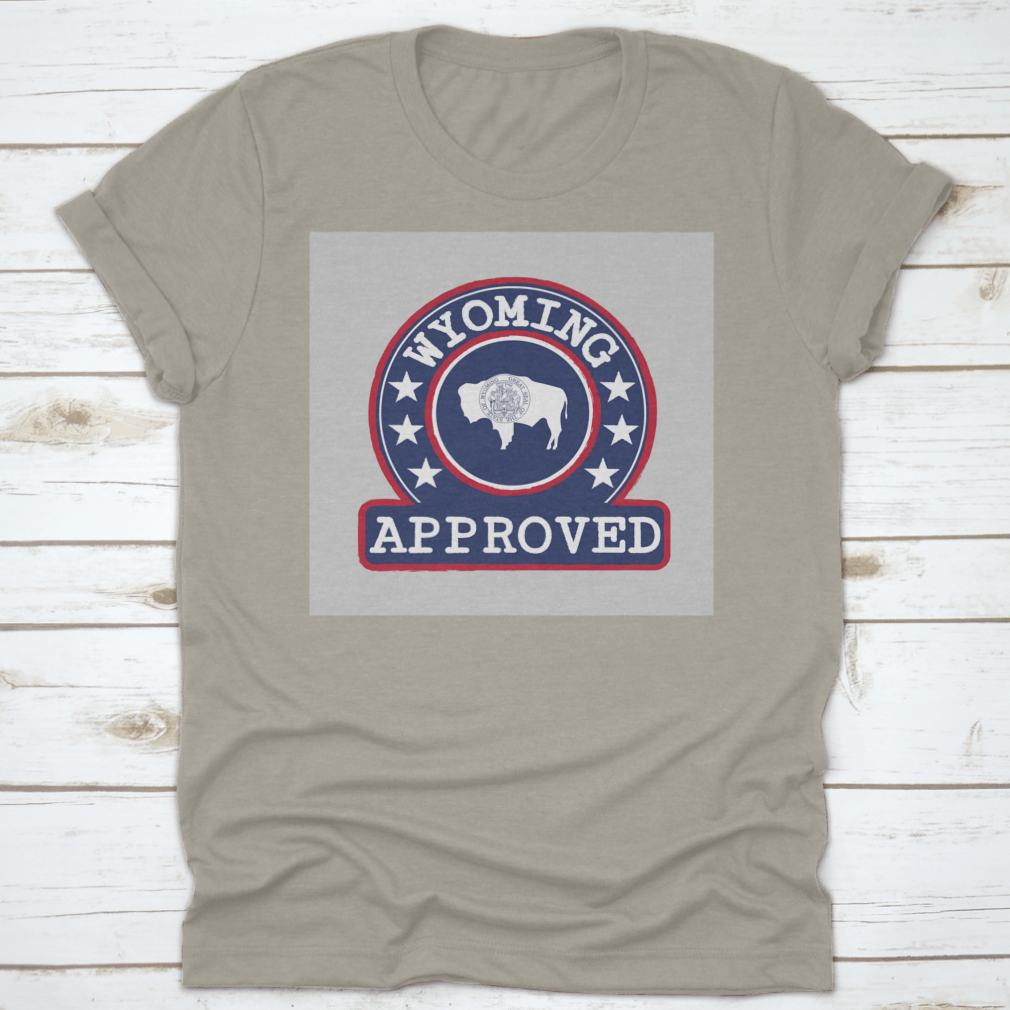 Vector stamp of approved logo featuring the Wyoming flag in a round shape, displayed on a comfortable cotton t-shirt.