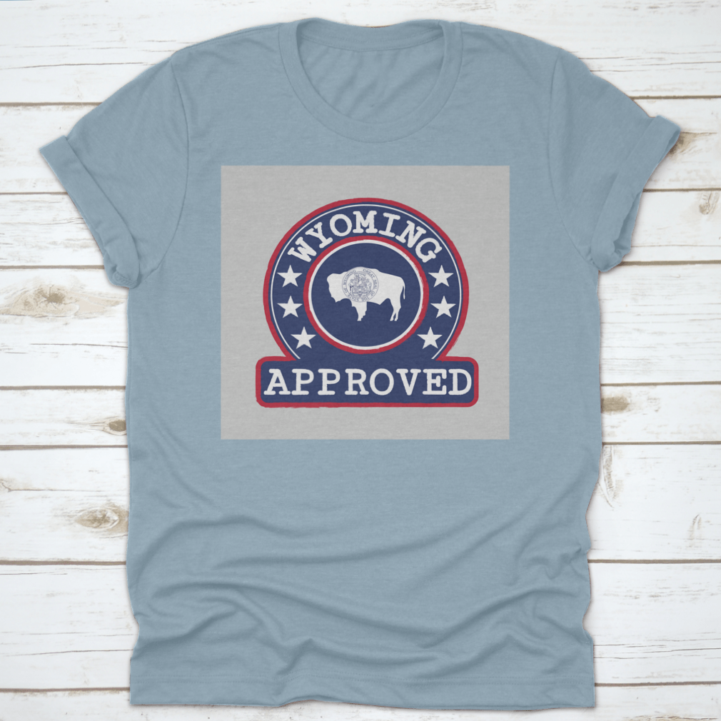 Vector stamp of approved logo featuring the Wyoming flag in a round shape, displayed on a comfortable cotton t-shirt.