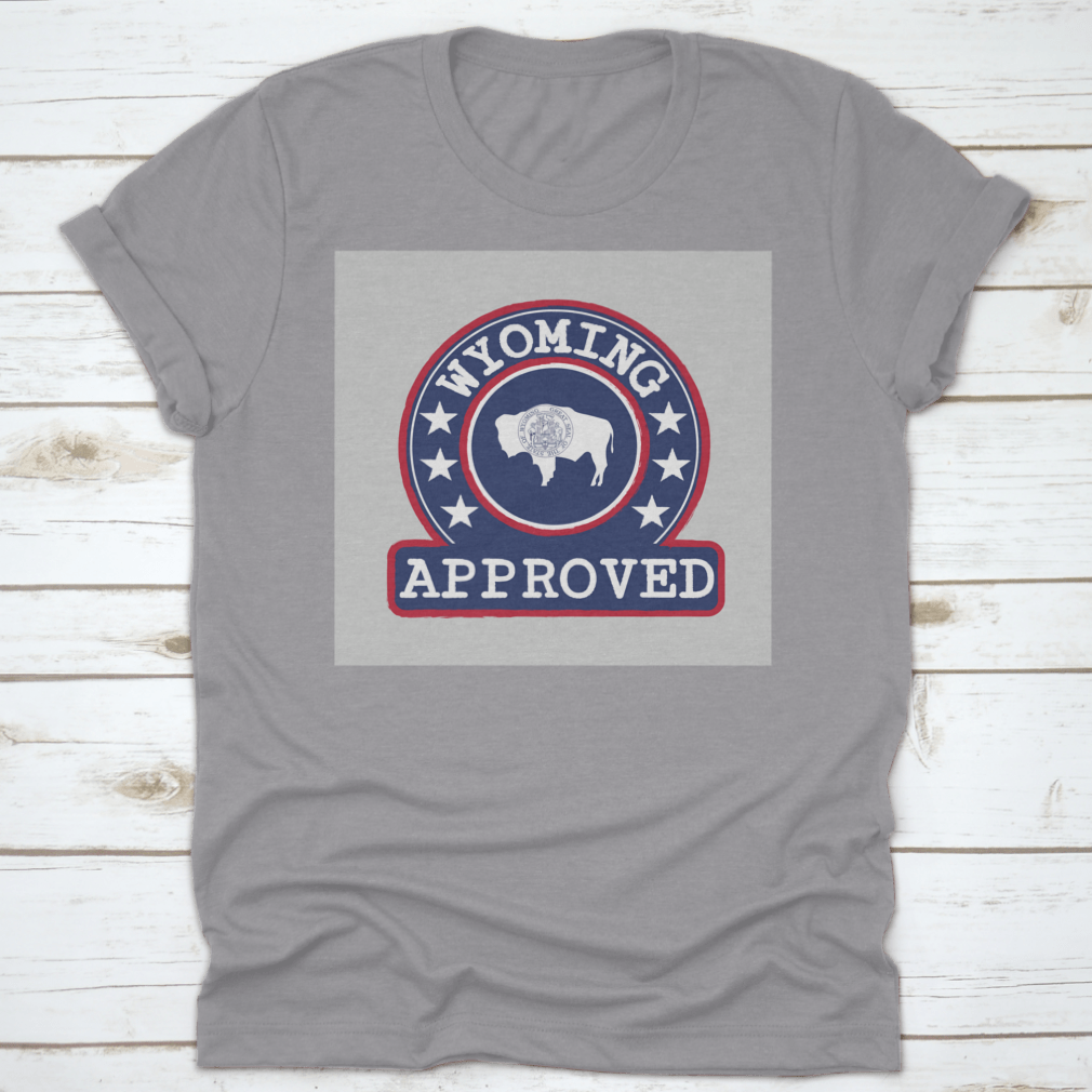 Vector stamp of approved logo featuring the Wyoming flag in a round shape, displayed on a comfortable cotton t-shirt.