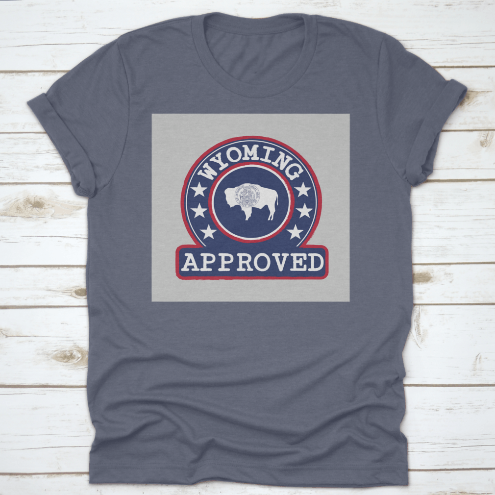 Vector stamp of approved logo featuring the Wyoming flag in a round shape, displayed on a comfortable cotton t-shirt.