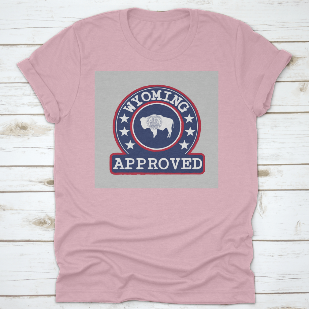 Vector stamp of approved logo featuring the Wyoming flag in a round shape, displayed on a comfortable cotton t-shirt.