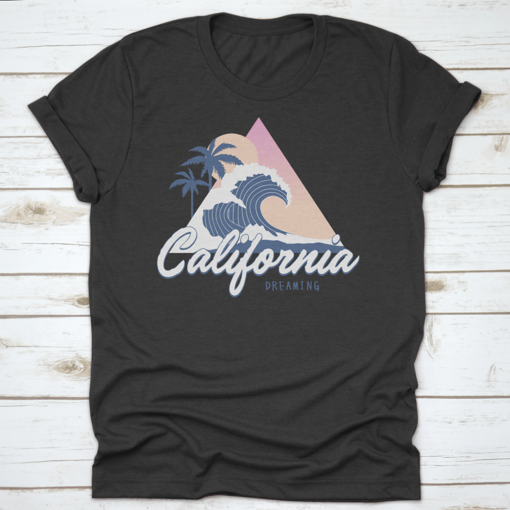 Vintage California Dreaming T-shirt featuring a tropical summer theme with a big wave design, made from soft cotton fabric.