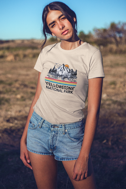 A vintage-style t-shirt featuring Yellowstone National Park design, made from soft cotton, perfect for outdoor enthusiasts.