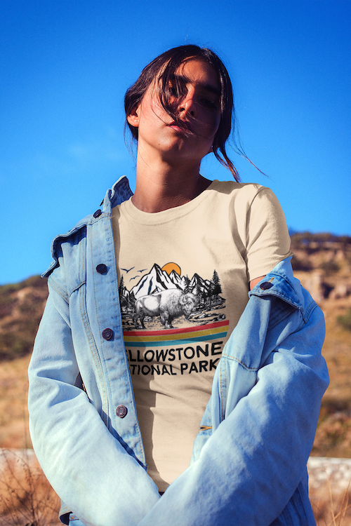 A vintage-style t-shirt featuring Yellowstone National Park design, made from soft cotton, perfect for outdoor enthusiasts.