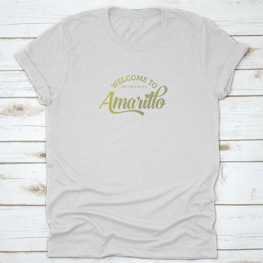 A stylish T-shirt featuring the words 'Welcome To Amarillo' in a creative font design, made from 100% cotton for comfort.