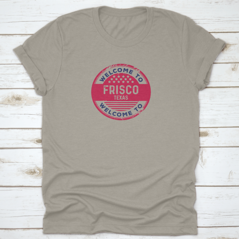 A stylish t-shirt featuring a badge vector illustration representing Frisco, Texas, made from 100% cotton with a classic fit.