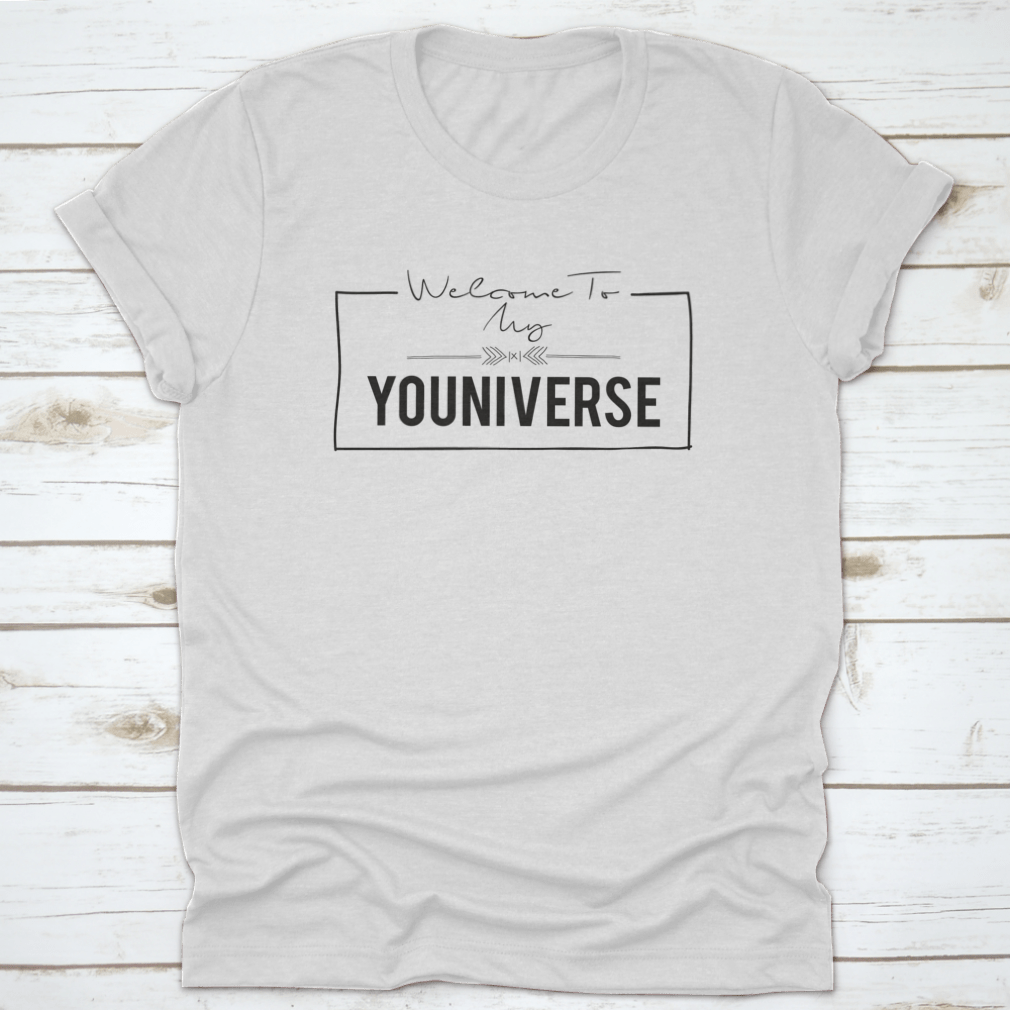 A stylish t-shirt featuring the slogan 'Welcome To My Youniverse' printed on it, made from 100% cotton for comfort.