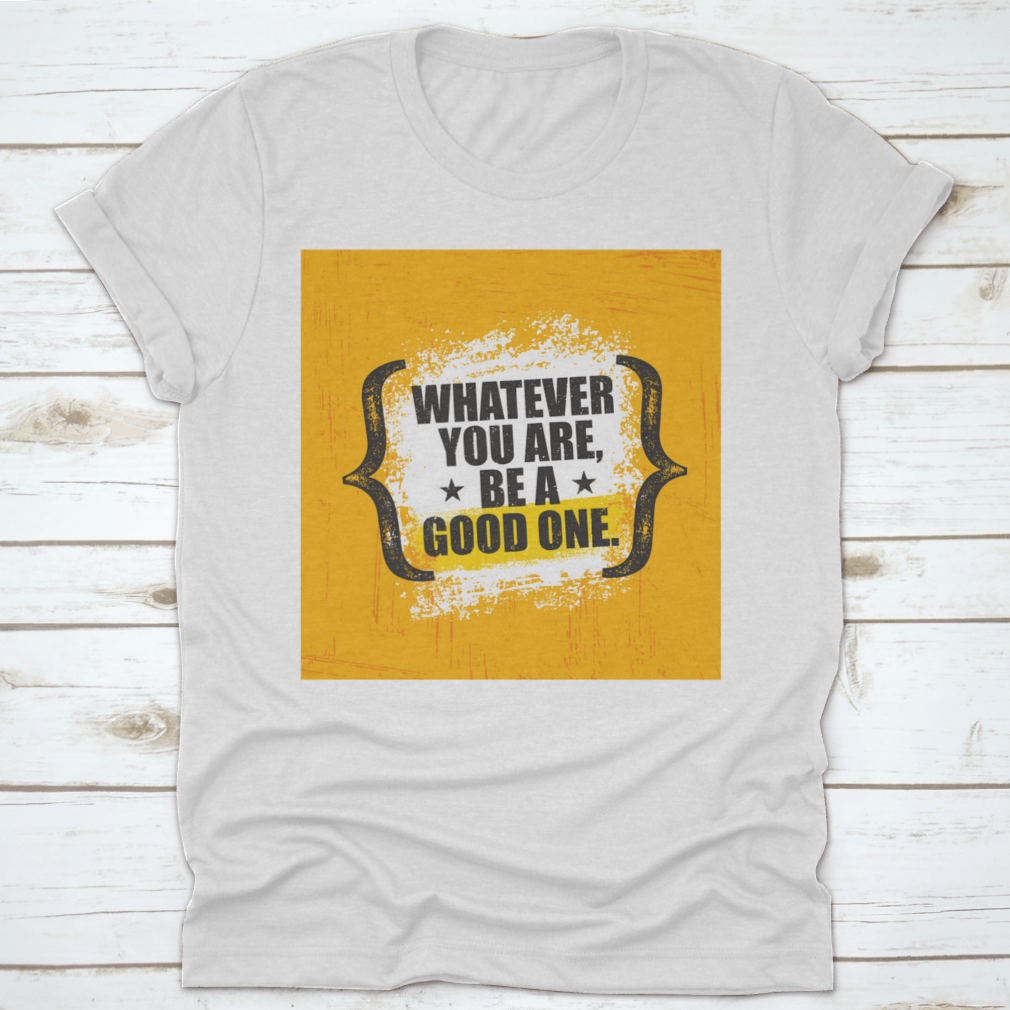 A stylish 'Whatever You Are, Be A Good One' T-Shirt made from 100% cotton, featuring a classic fit and motivational design.