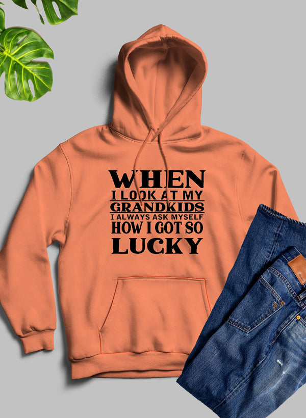 A cozy hoodie featuring a unique design celebrating grandkids, made from soft fleece blend material.