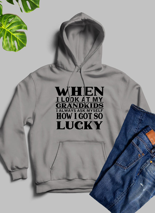 A cozy hoodie featuring a unique design celebrating grandkids, made from soft fleece blend material.