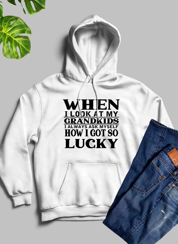 A cozy hoodie featuring a unique design celebrating grandkids, made from soft fleece blend material.