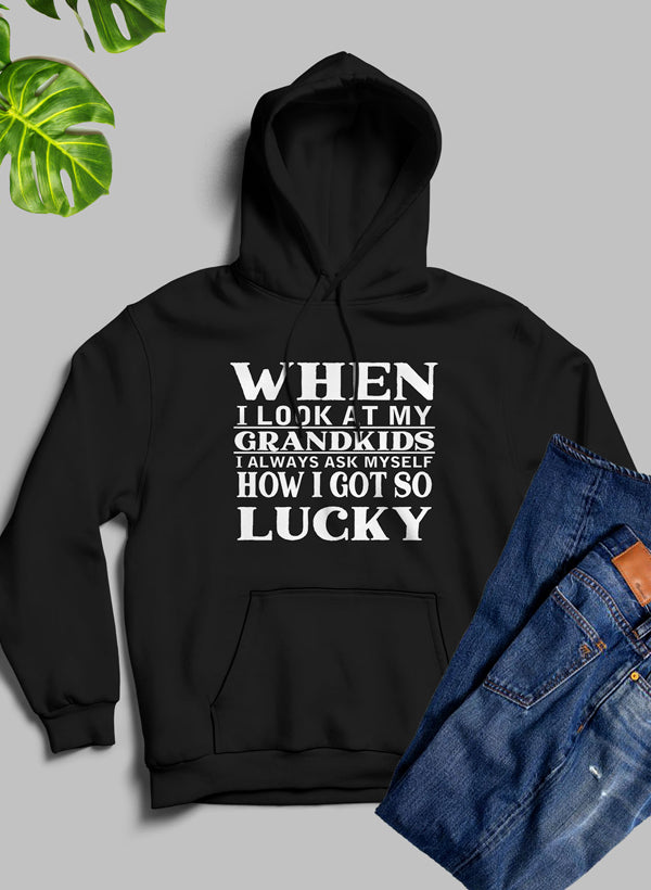 A cozy hoodie featuring a unique design celebrating grandkids, made from soft fleece blend material.