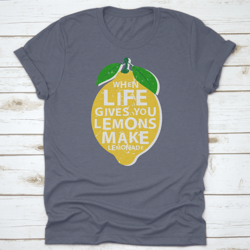 A motivational t-shirt featuring the phrase 'When Life Gives You Lemons, Make Lemonade' in a vibrant lemon-themed design.