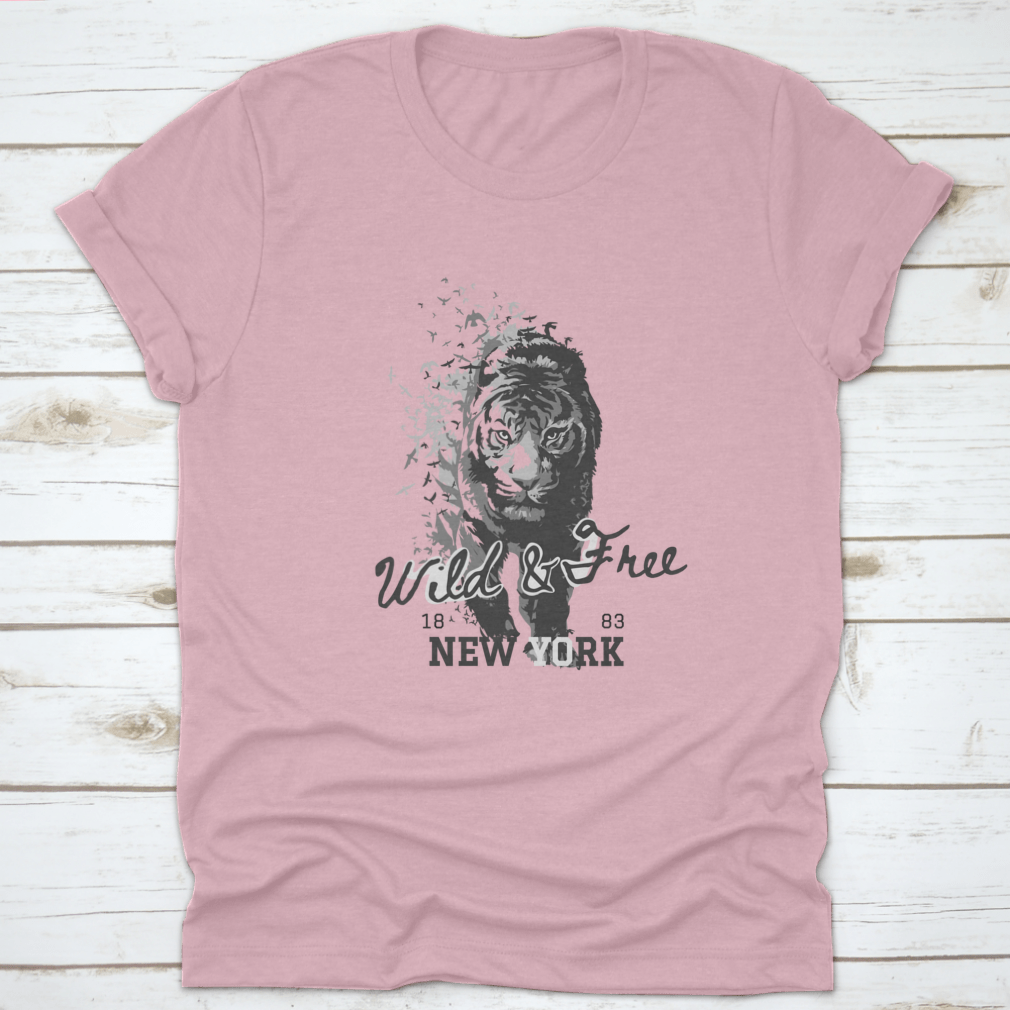 A stylish t-shirt featuring a Wild And Free slogan with a tiger walking in a bird silhouette, showcasing a unique and adventurous design.