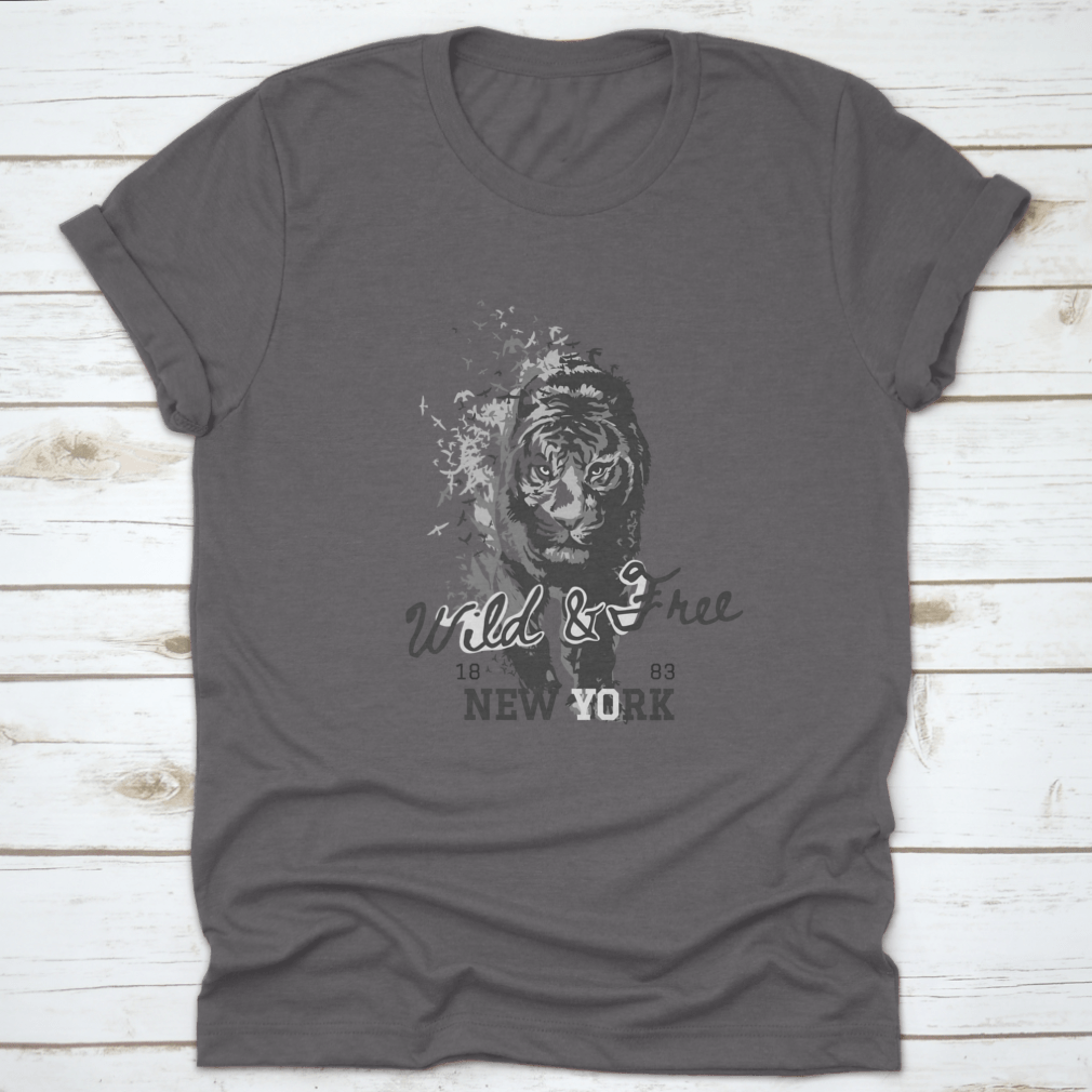 A stylish t-shirt featuring a Wild And Free slogan with a tiger walking in a bird silhouette, showcasing a unique and adventurous design.