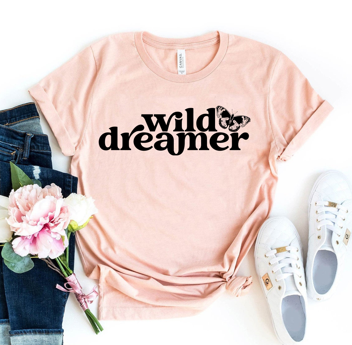 Wild Dreamer T-shirt made of premium ring spun cotton, featuring a soft textile flex print design in various sizes.