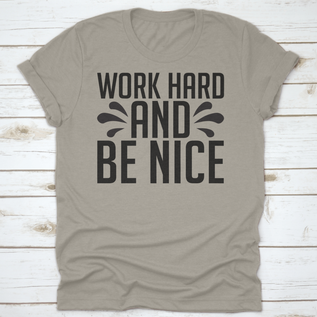 A stylish Work Hard And Be Nice T-Shirt made from 100% cotton, featuring a classic fit and midweight fabric, perfect for casual wear.