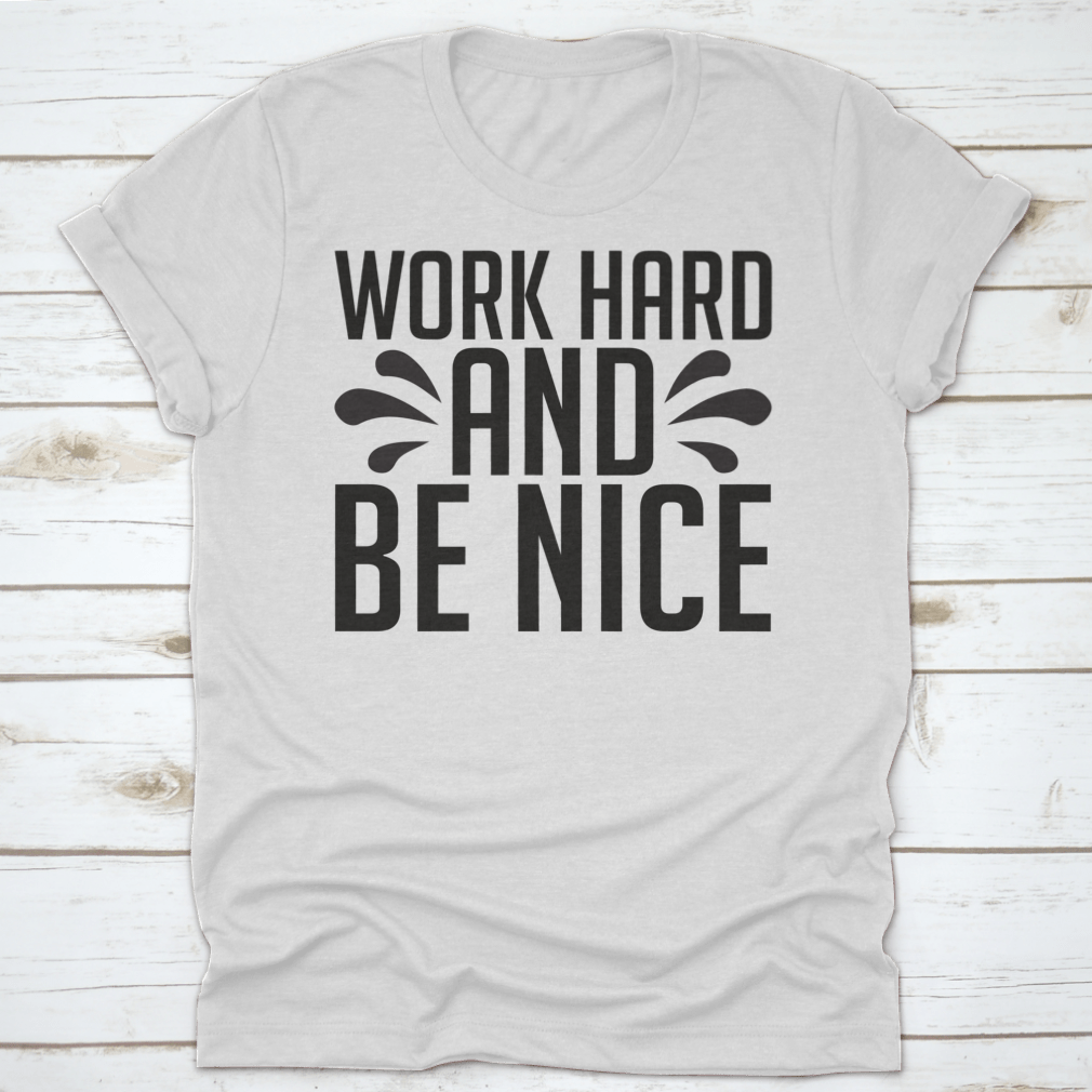 A stylish Work Hard And Be Nice T-Shirt made from 100% cotton, featuring a classic fit and midweight fabric, perfect for casual wear.