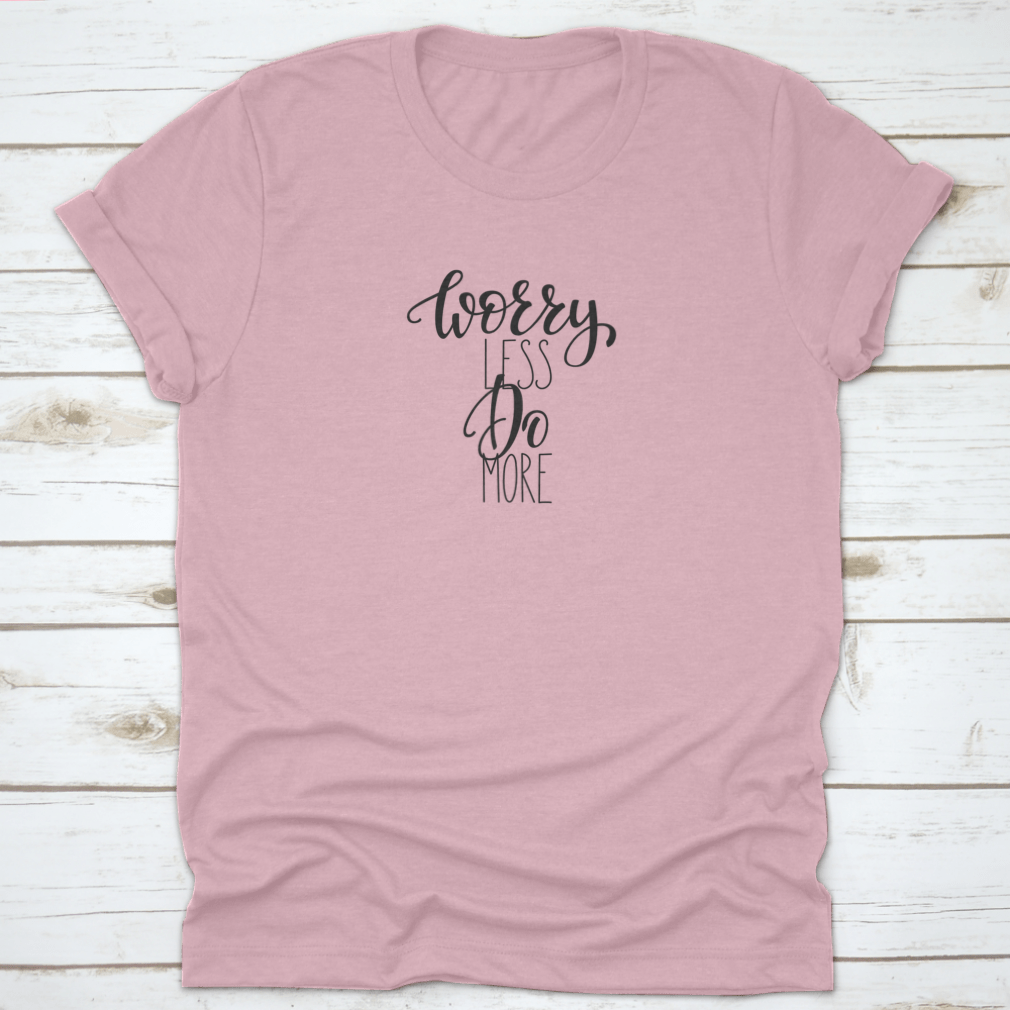 A stylish cotton tee featuring the inspirational quote 'Worry Less Do More' in elegant calligraphy lettering.