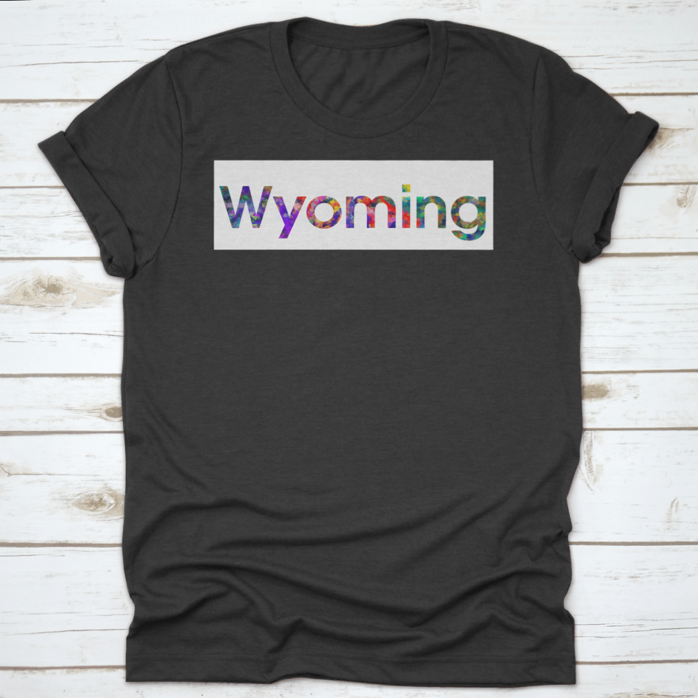 A vibrant Wyoming Colorful Word Shirt showcasing the word 'Wyoming' in bright colors on a soft cotton fabric.