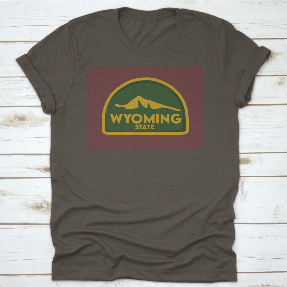 A comfortable Wyoming State travel shirt design featuring a green world theme, made from 100% cotton, perfect for travel enthusiasts.