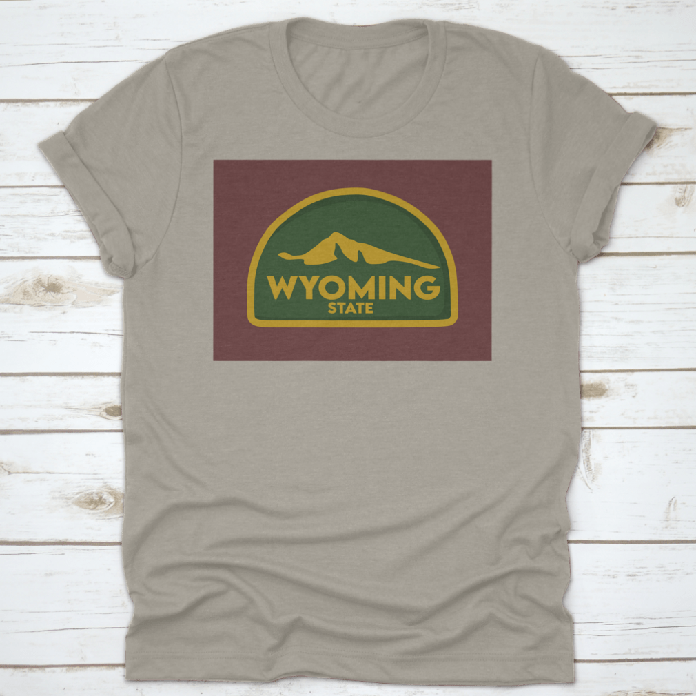 A comfortable Wyoming State travel shirt design featuring a green world theme, made from 100% cotton, perfect for travel enthusiasts.