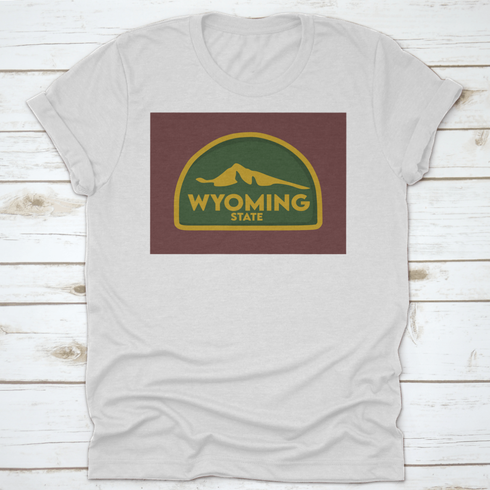 A comfortable Wyoming State travel shirt design featuring a green world theme, made from 100% cotton, perfect for travel enthusiasts.