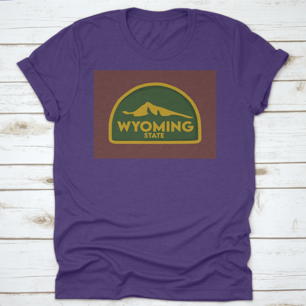 A comfortable Wyoming State travel shirt design featuring a green world theme, made from 100% cotton, perfect for travel enthusiasts.