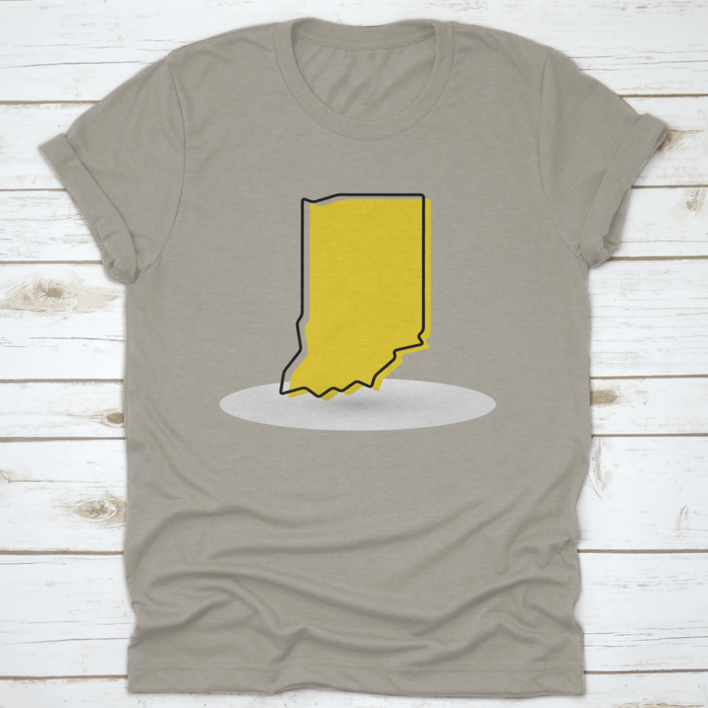 A stylish yellow outline map of Indiana printed on a comfortable cotton shirt, showcasing a unique design for Indiana enthusiasts.