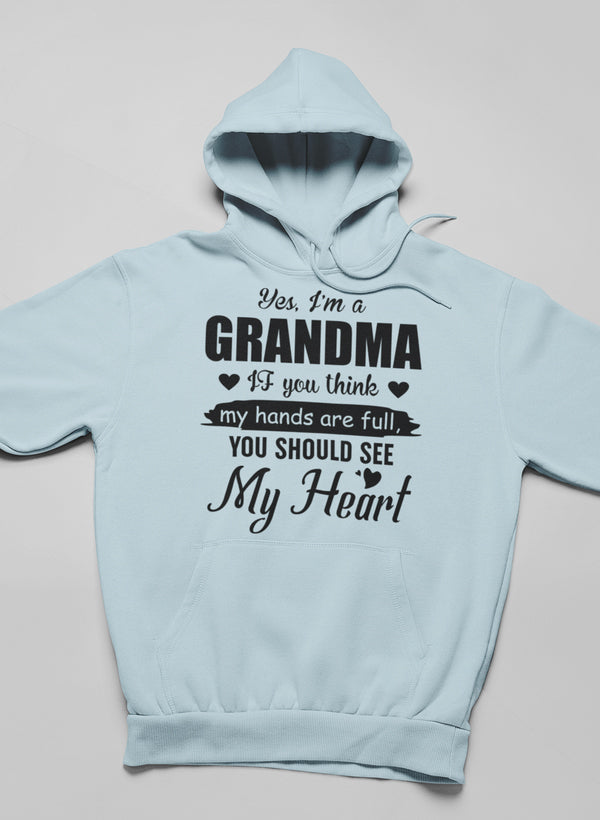 Cozy Yes, I Am A Grandma Hoodie featuring a stylish design, adjustable hood, and banded cuffs, perfect for grandmas.