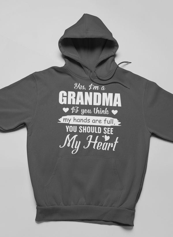 Cozy Yes, I Am A Grandma Hoodie featuring a stylish design, adjustable hood, and banded cuffs, perfect for grandmas.