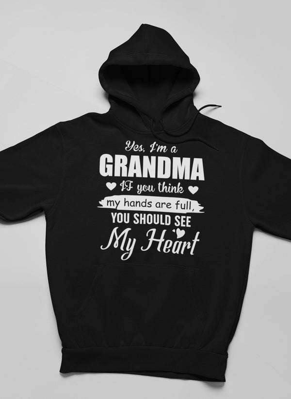 Cozy Yes, I Am A Grandma Hoodie featuring a stylish design, adjustable hood, and banded cuffs, perfect for grandmas.