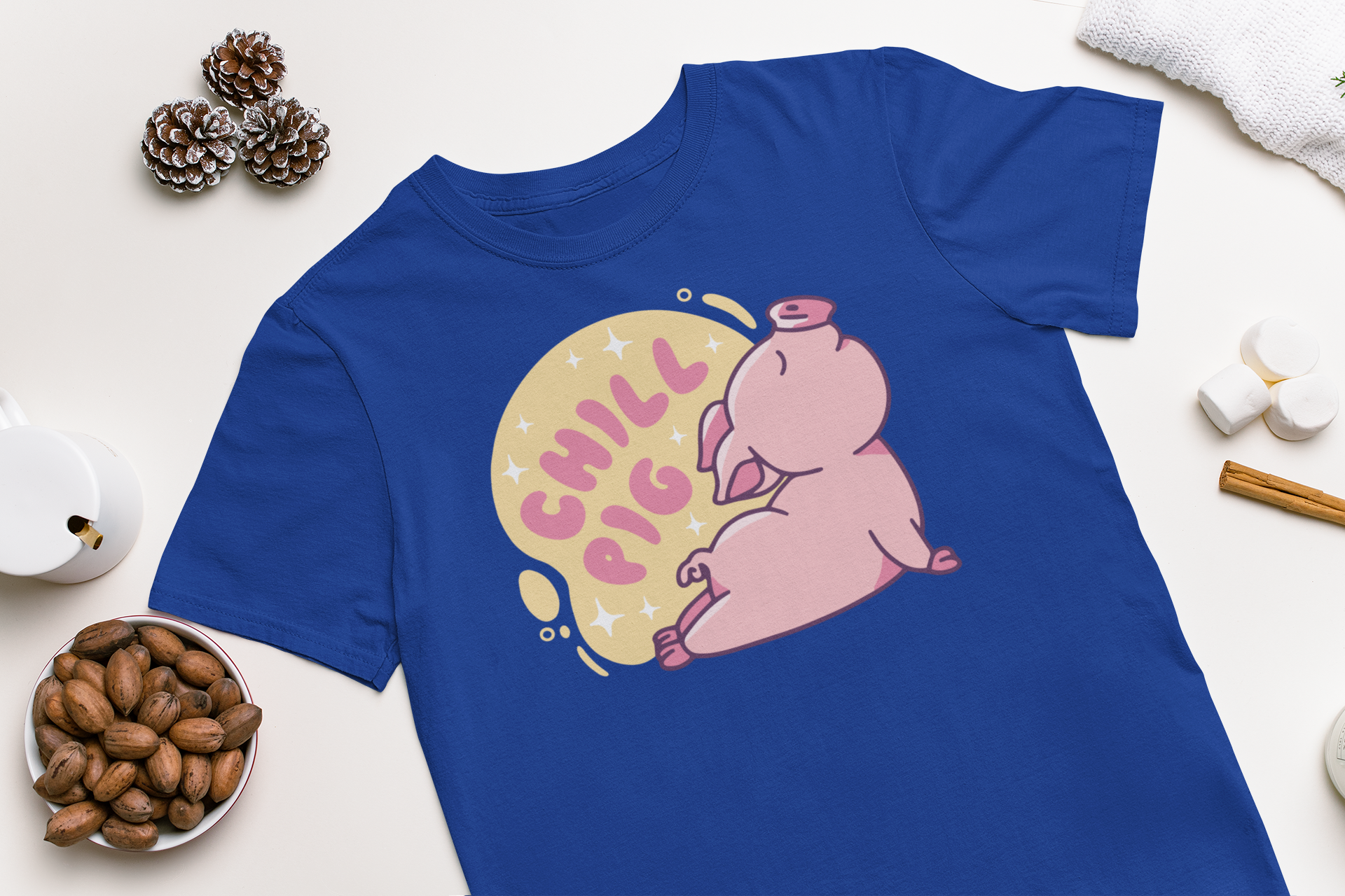 A cute t-shirt featuring a pig doing a yoga pose with sparkles and the quote 'Chill pig'.