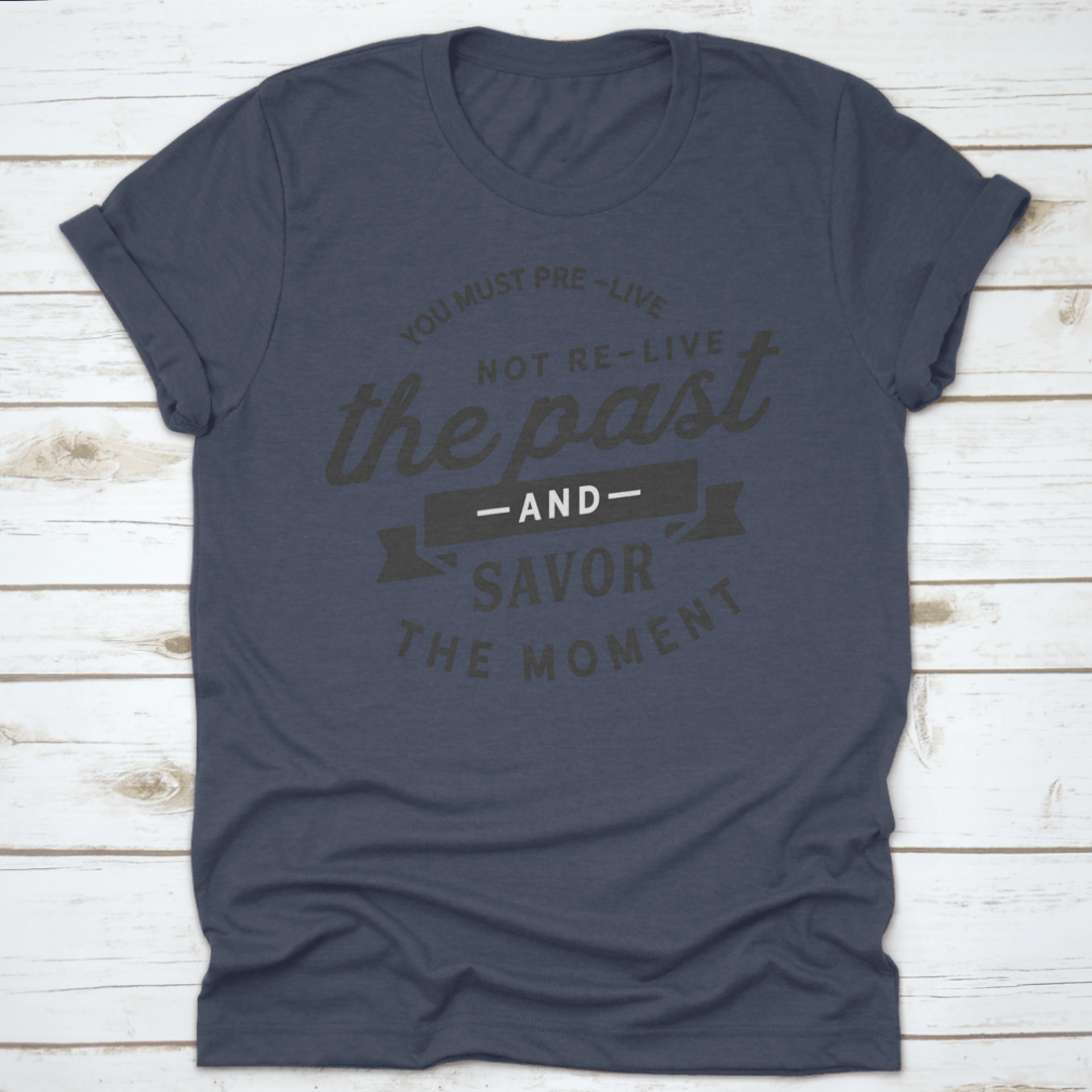 A motivational t-shirt featuring the phrase 'You Must Pre-Live The Future Not Re-Live The Past', made from soft cotton fabric.