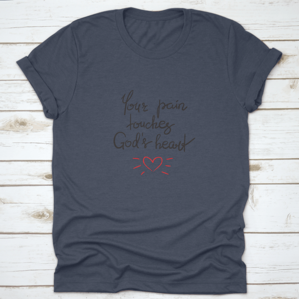 A stylish cotton shirt featuring the motivational quote 'Your Pain Touches God's Heart' in elegant lettering, perfect for religious individuals.