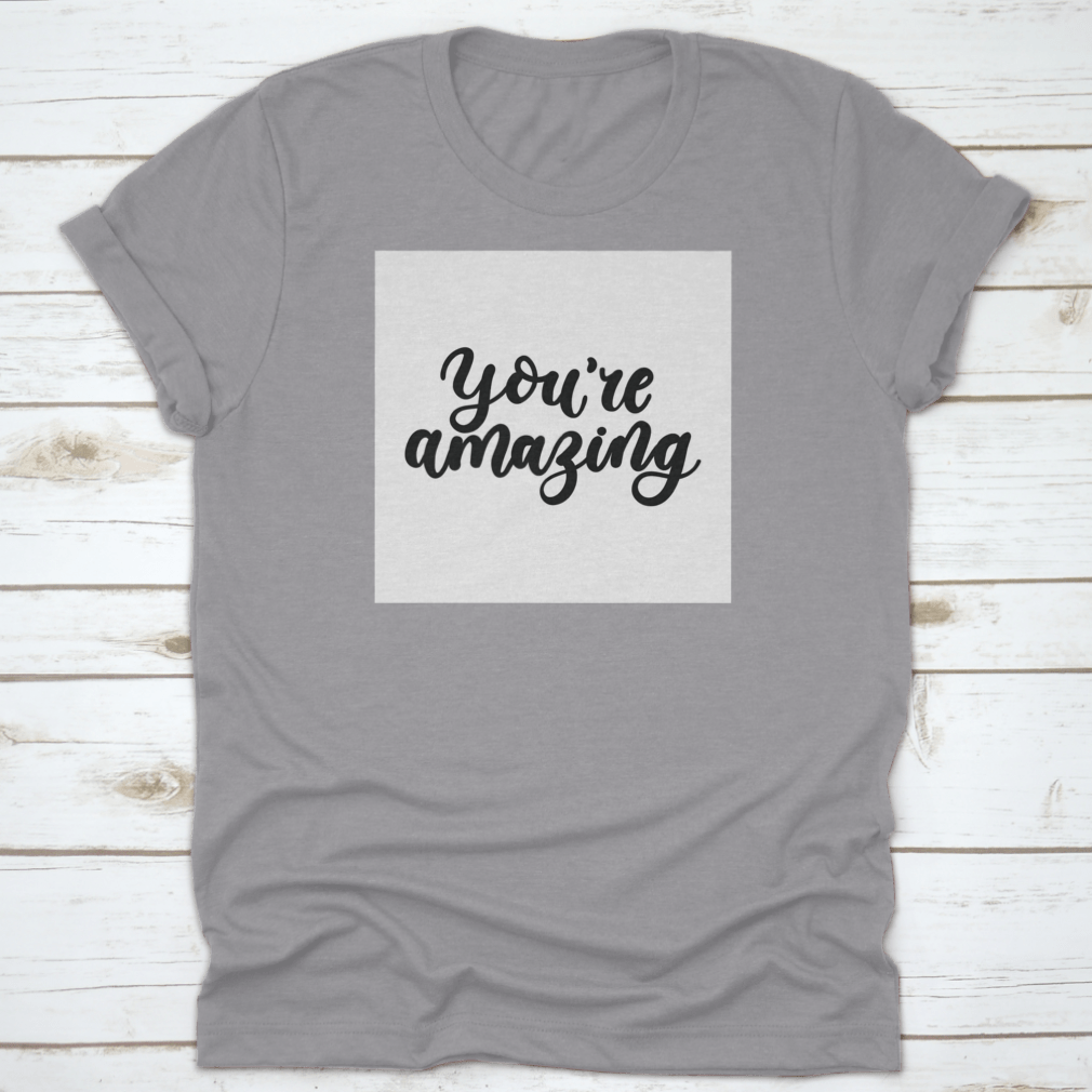 You're Amazing Inspirational Lettering Card featuring cute and kind lettering design on a cotton background.