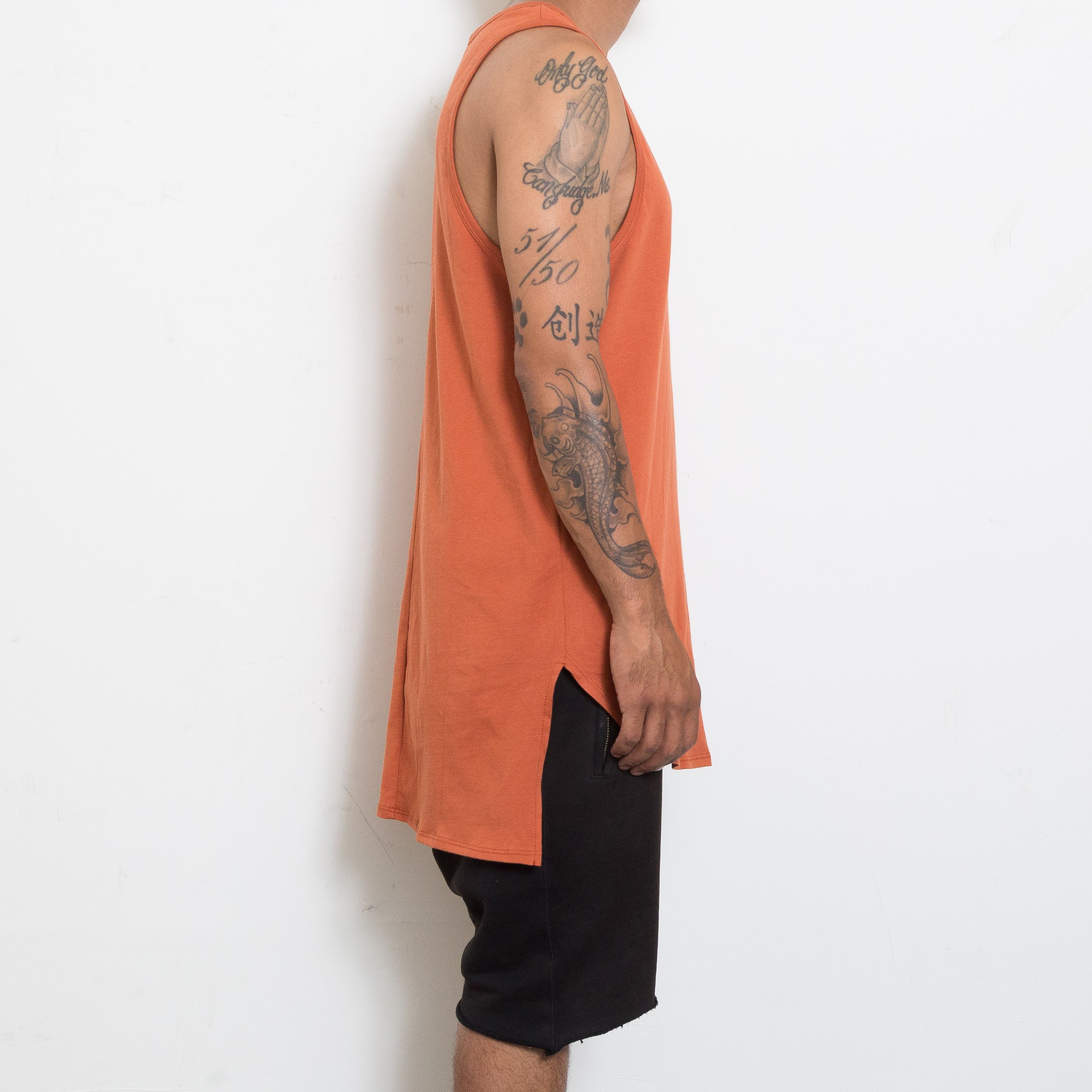 Scott Hi Low Tank featuring a trendy hi-lo design and muscle tank style, perfect for casual wear.