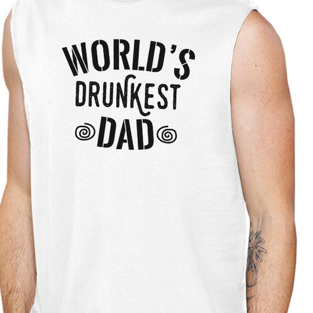 Men's white muscle tank top featuring a humorous graphic design that reads 'World's Drunkest Dad', made from 100% ring spun cotton.