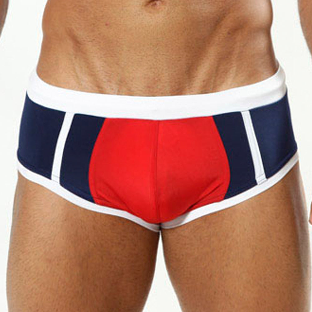 Cover Male CM0706 Red Navy Swim Boxer featuring a bold red, navy, and white design with a low waist cut and adjustable drawstring waistband.