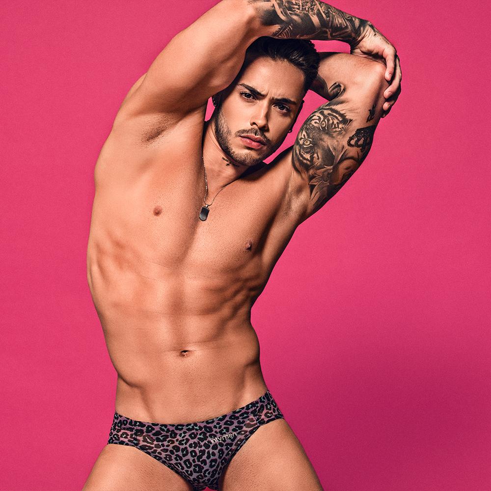 Intymen INI025 Leopard Bikini featuring a bold leopard print design, made from soft polyamide fabric, showcasing its snug fit and contour pouch.