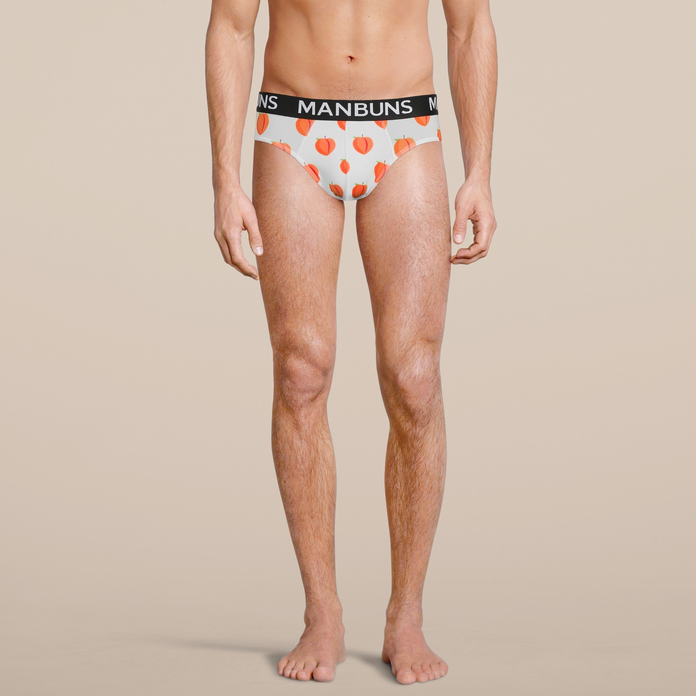 Men's Peach Brief Underwear made from breathable mesh fabric, featuring a slim fit design and vibrant peach color, perfect for workouts and casual wear.