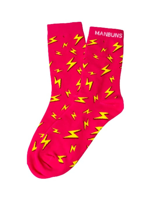 A pair of vibrant pink crew socks featuring a bold lightning bolt design, perfect for adding a fun touch to any outfit.