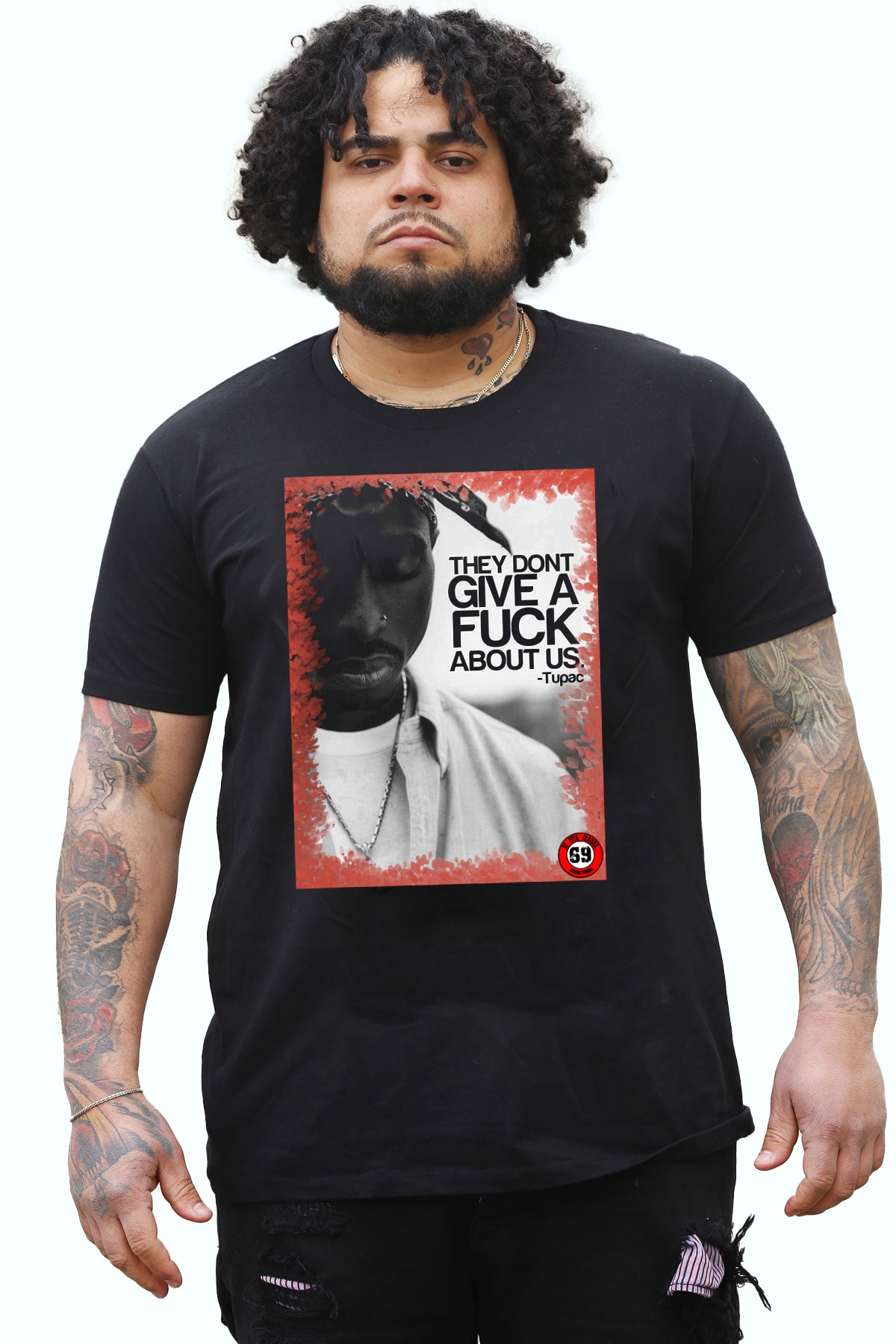 Black short-sleeved crew-neck t-shirt featuring 2Pac Give a F*ck design, made from breathable jersey cotton with handmade prints.