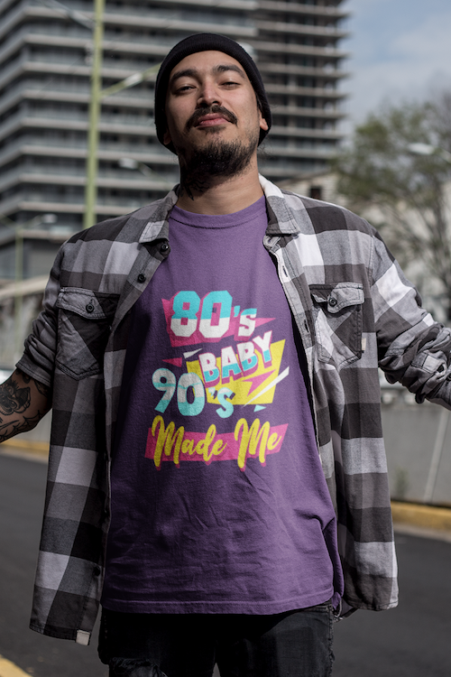 A stylish unisex t-shirt featuring the phrase '80's Baby 90's Made Me' printed on soft ring-spun cotton fabric.