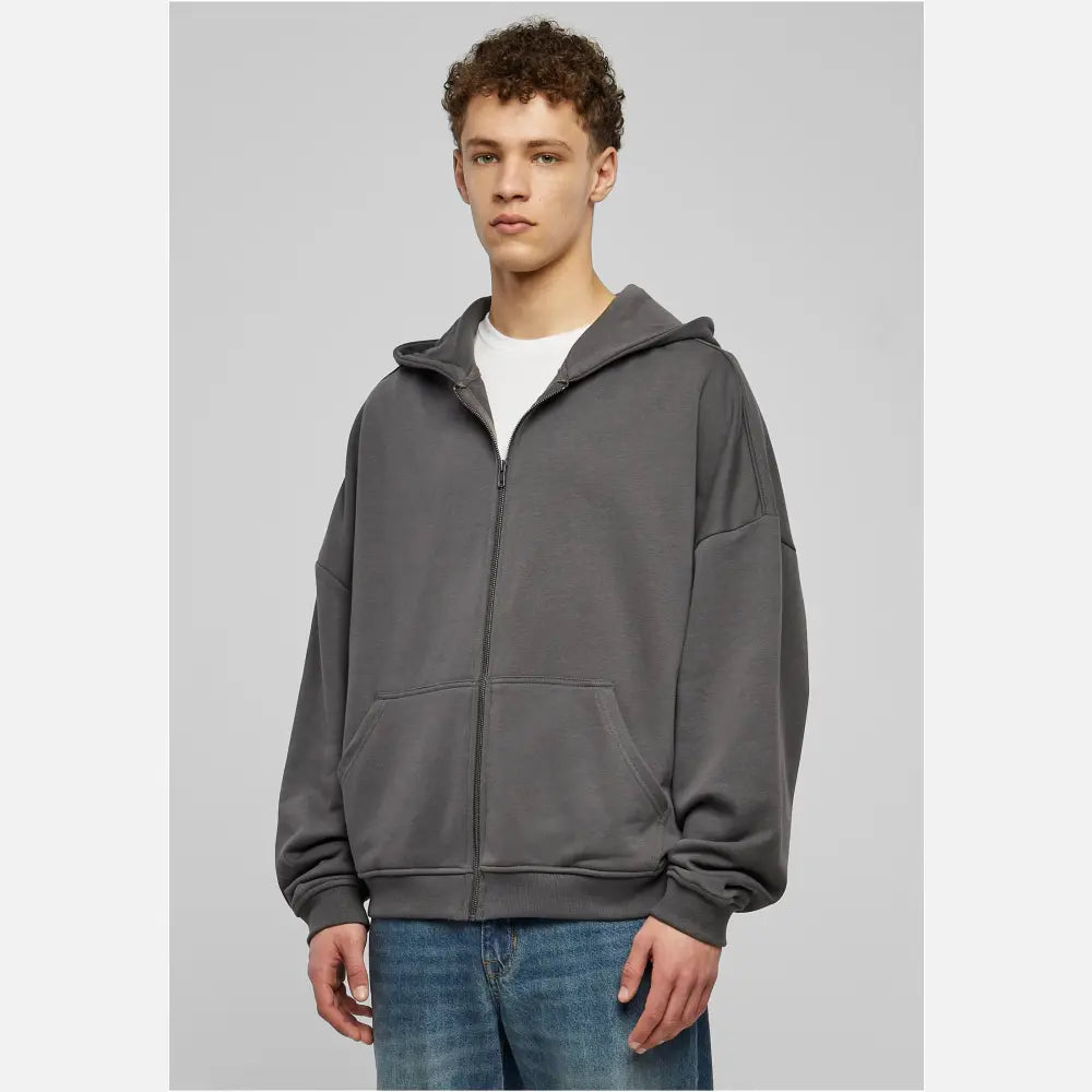 Men's 90s Zip Hoodie in soft terry fabric, featuring a large hood, split kangaroo pocket, and metal zipper for a stylish urban look.